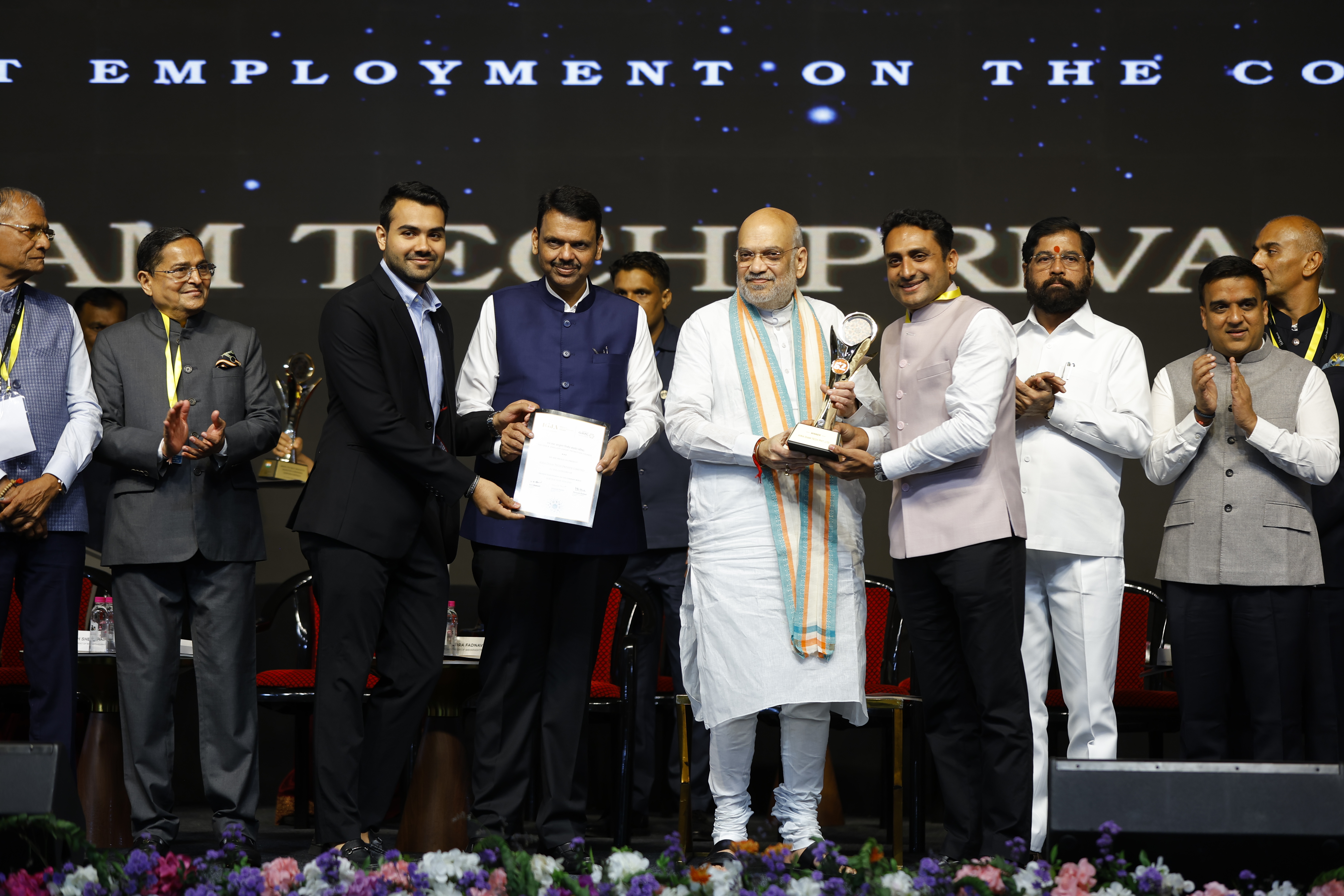 Shanay Parekh and Ashish Lakhani receive the Highest Employment on Company Rolls award from Shri Amit Shah