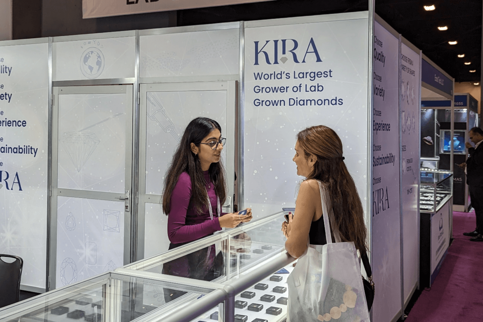 Visitors at Kira's Exhibition Booth
